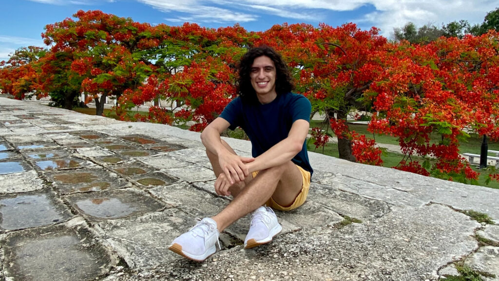 Joshua Wasserman posing amongst the Cuban foliage.