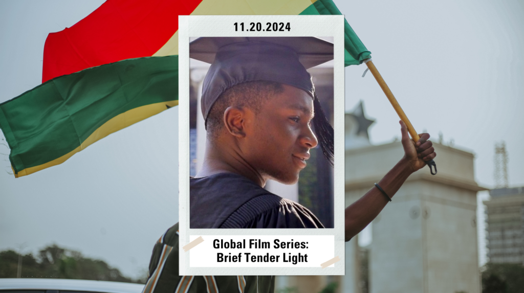 An image of a man holding a flag from Ghana with a graduation cap on.