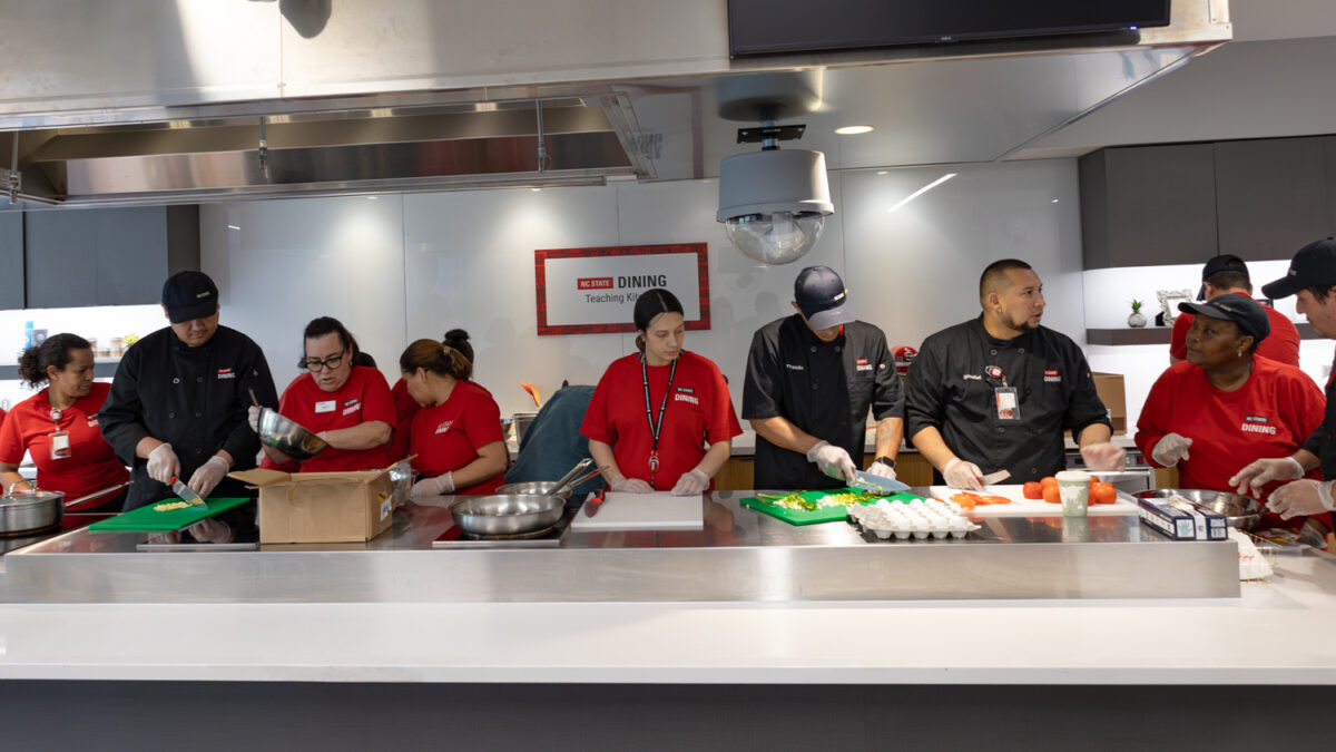 NC State Dining Employees prepare a lunch as their final project in the IEP program.