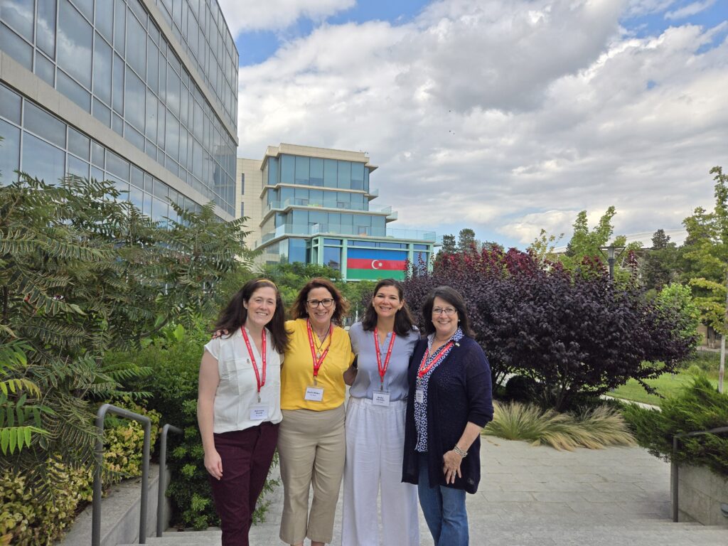 Adrienne Shank, Paula Wilder, Becky Cibulskis and Cate Madden host a teacher conference in Baku, Azerbaijan (2024).