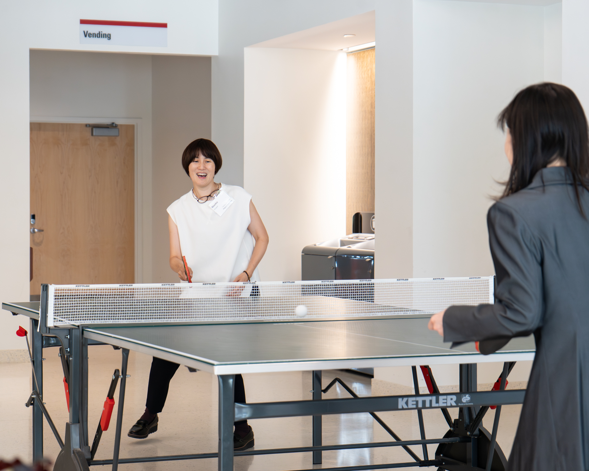 Nagoya University delegates blow off some steam at PSI playing ping pong