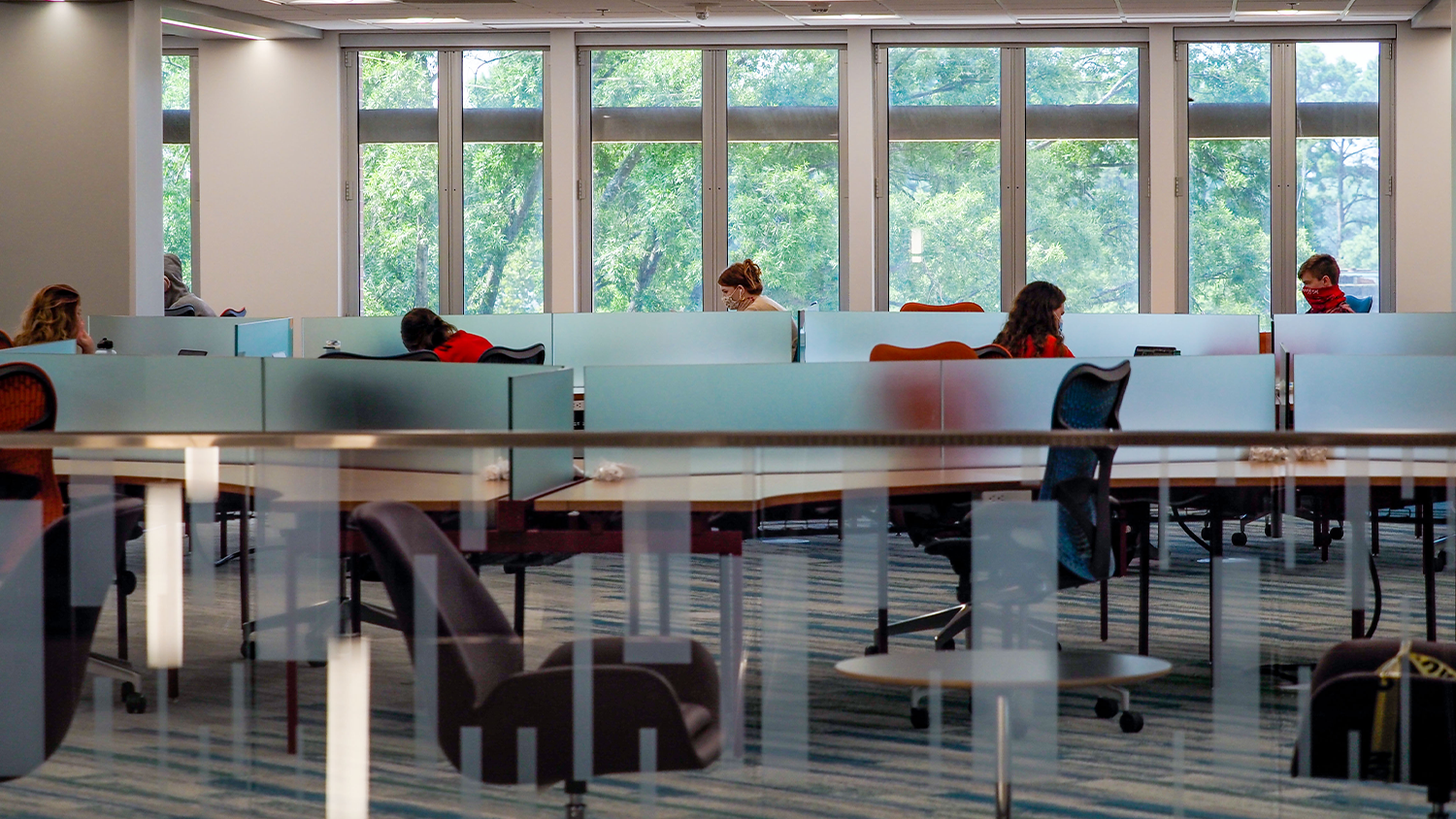 Students work in the newly renovated DH Hill Library on the first day of classes for the fall 2020 semester.